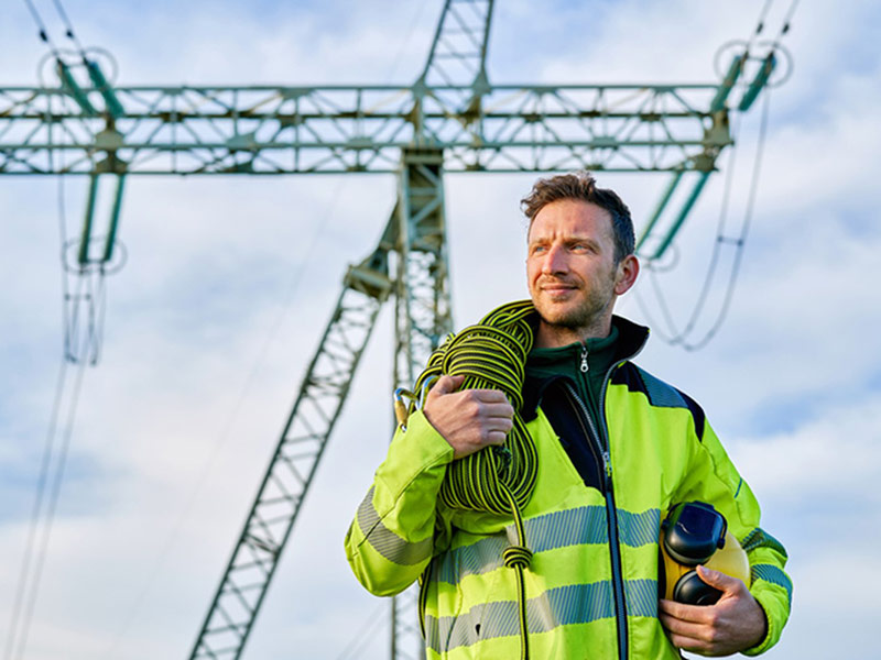 A men with a wires in construction site