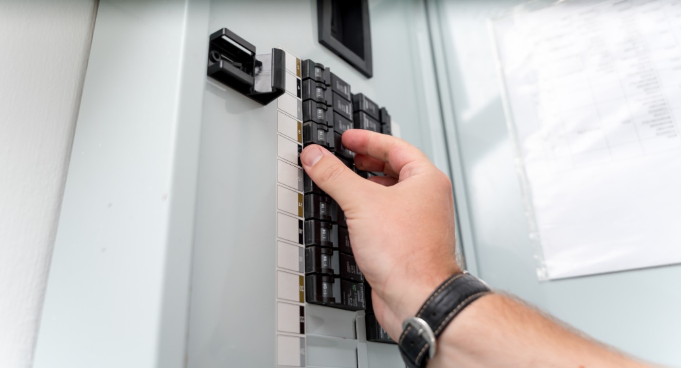 A Technician has recently installed a Whole-House Surge Protector at a House in Frederick, MD